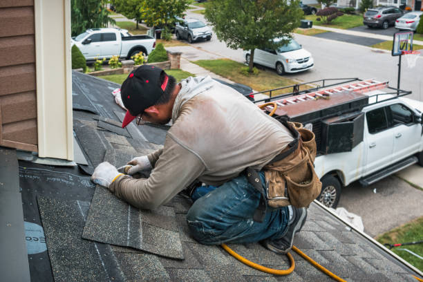 Professional Roofing technician working in Atlanta, ID